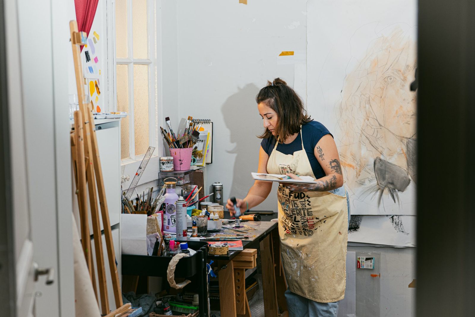 Pilarcho painting in her Barcelona studio.